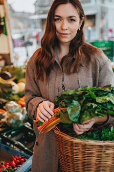 Smiling woman selects fresh vegetables at Erfurt's bustling outdoor market.